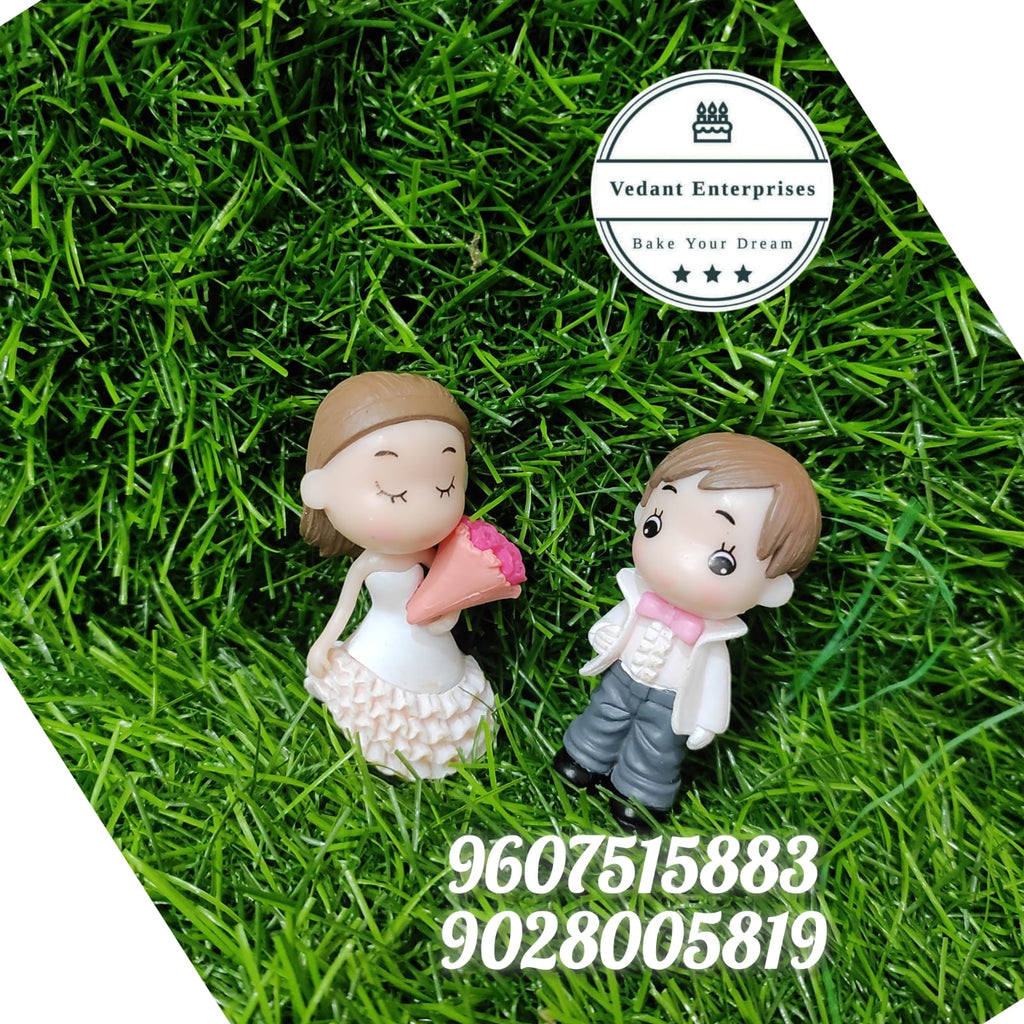 Couple Miniature Figures