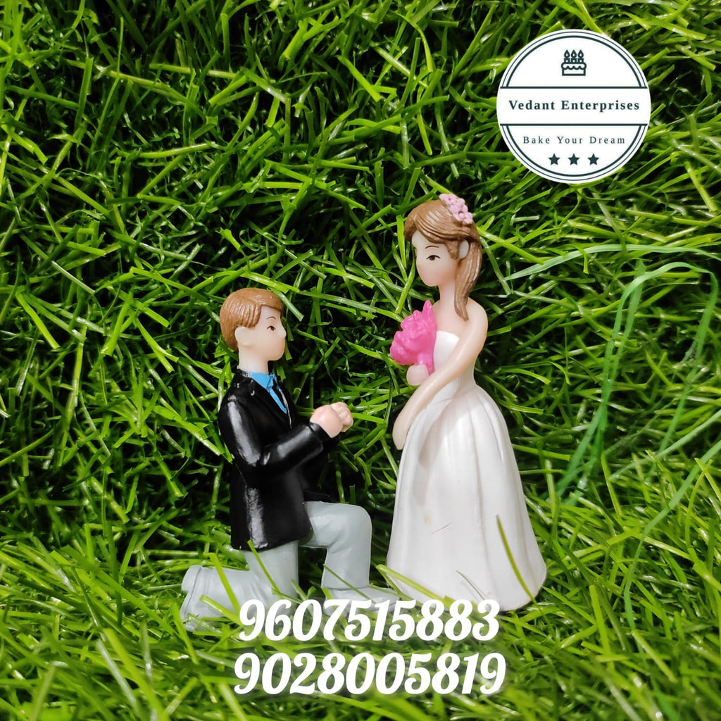 Couple Miniature Figures