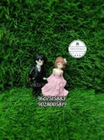 Couple Miniature Figures