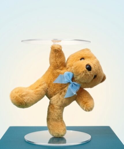 Vedant Enterprises floating teddy bear cake stand with clear acrylic plates for baby shower cake display.